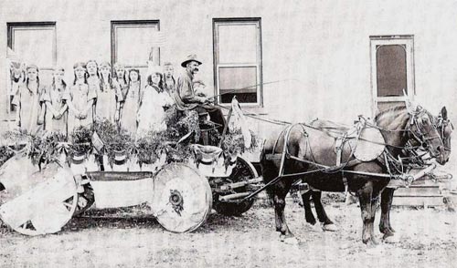 Photo from a Heilwood 4th of July parade, circa 1918-19. Group pictured is possibly the Camp Fire Girls.
