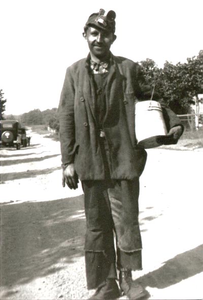 A Heilwood miner on his way home after a day's work, circa 1930.
