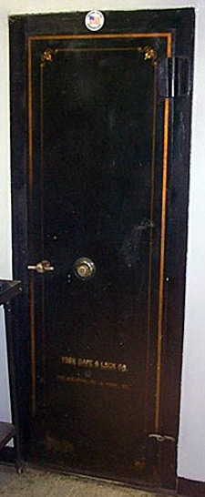 These photos show two safes (one in the basement and one on the first floor) installed in the "new" Penn Mary office building circa 1910-11. Both safes were walk-in types and were used for payroll and records storage. The safes are located near the center of the building and stacked on top of each other, with walls about 14"-18" thick.