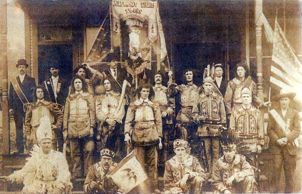 Natassin Tribe, Lodge #488, Improved Order of Red Men, Heilwood, Pennsylvania. This photo (circa 1910) was taken on the front steps of the Barber Shop. The door on the left side led to the second floor, where they conducted meetings.