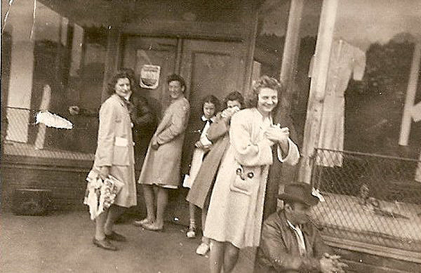 Heilwood Company Store employees, waiting for the store to open
