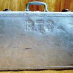 Monogrammed, aluminum suitcase used by a Heilwood resident who served in the military during World War II.